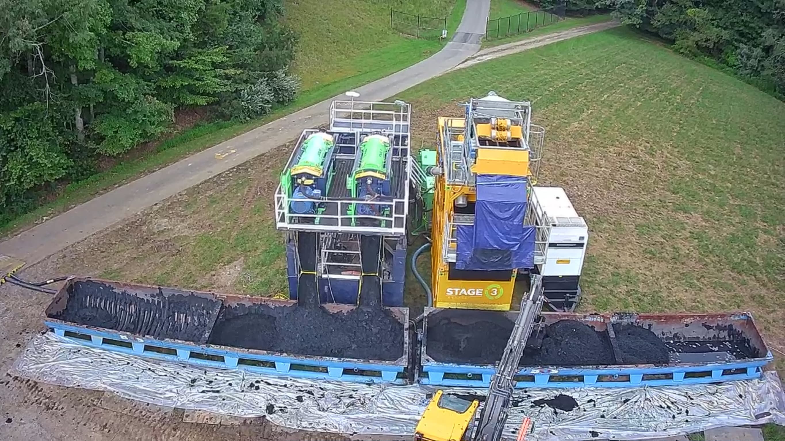 Dredging project site with material-processing equipment