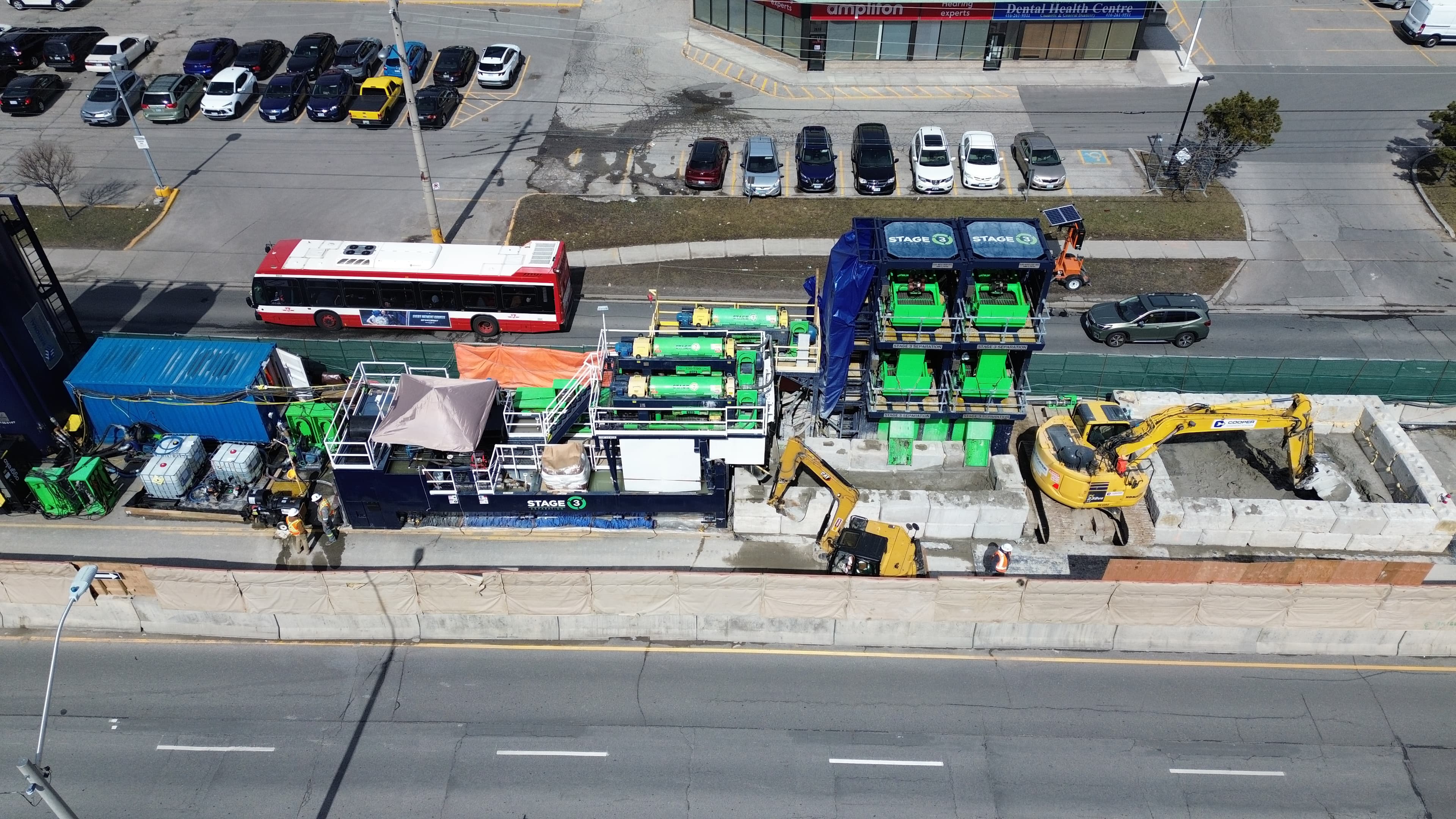 Aerial view of a jet-grouting material-treatment system in a constrained urban site